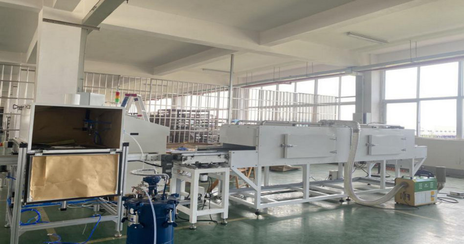 永利集团特瓷陶瓷橡胶复合衬板硫化喷胶线